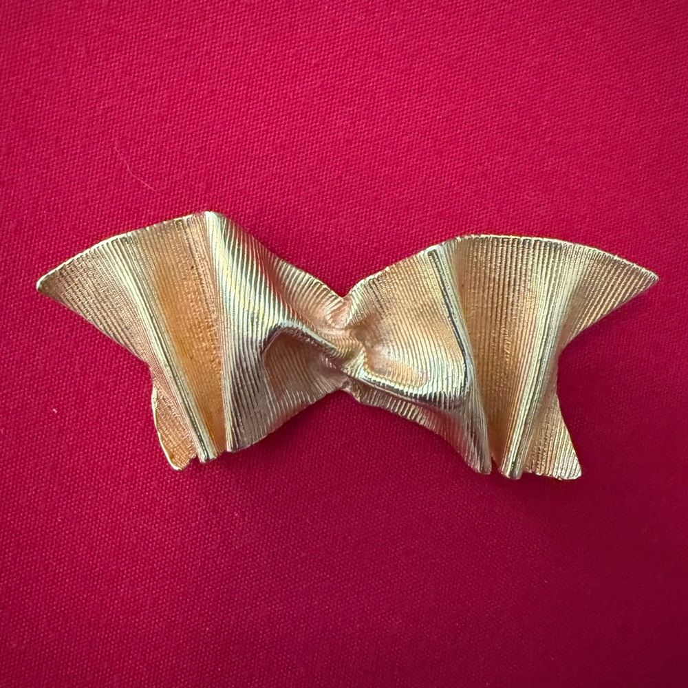 Mignon Faget vintage, initialed gold tone brooch from Knots and Bows collection